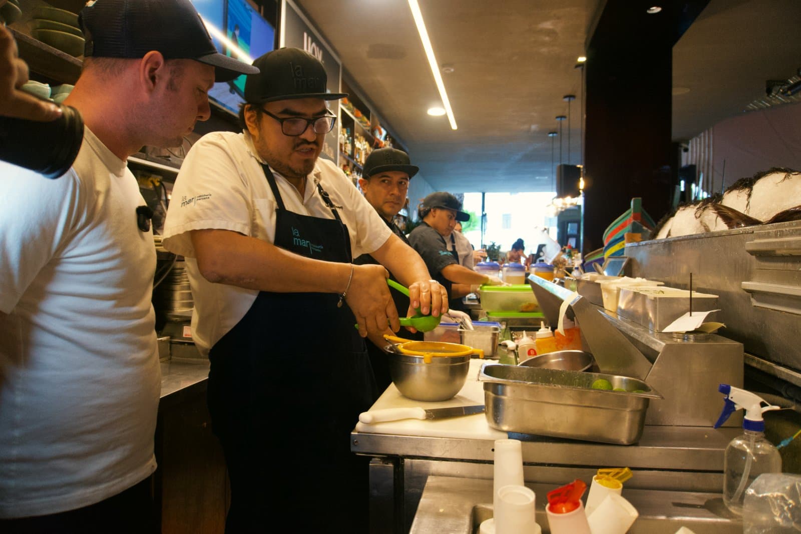 Pressing the limes on the La Mar ceviche line